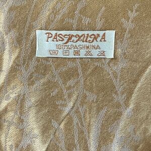 Pashmina gold/cream scarf. Could also be used as a
Table runner.